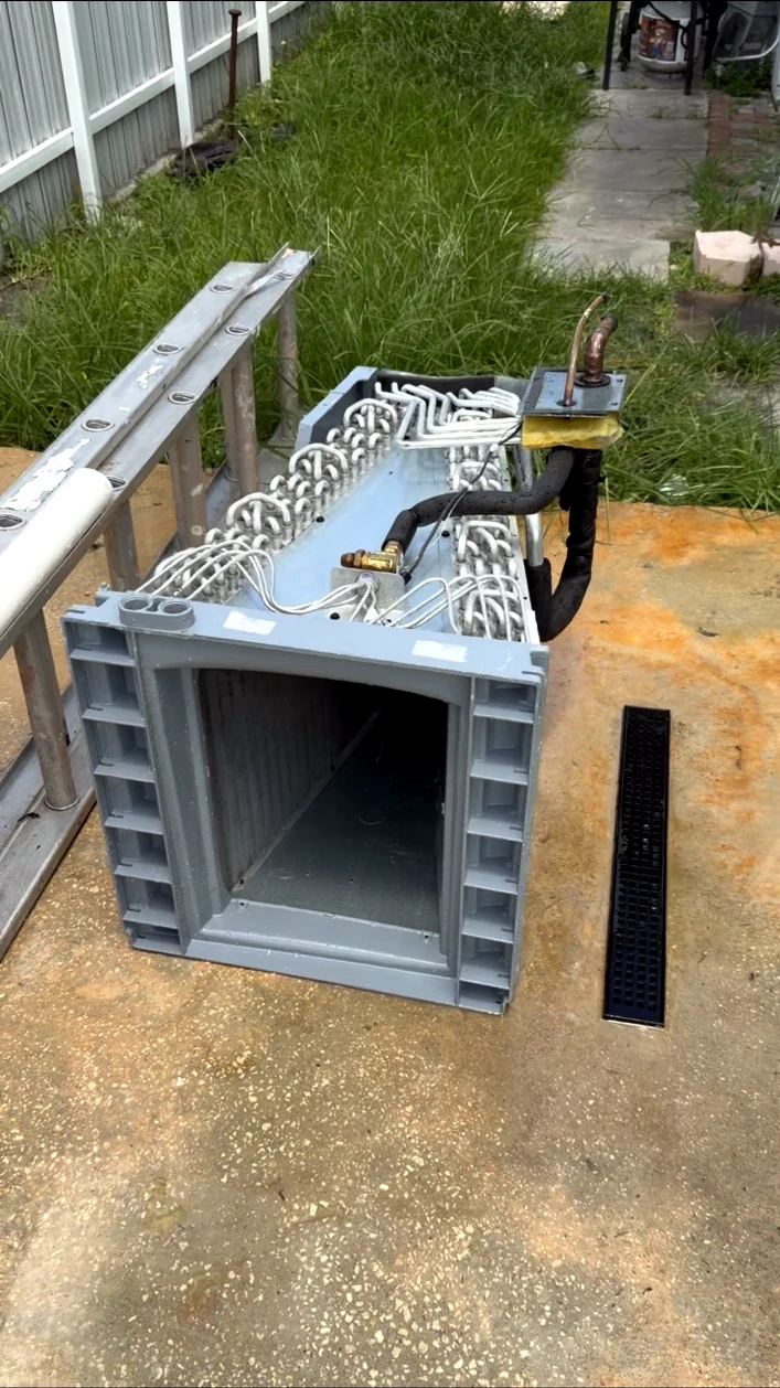 New HVAC evaporator coil prepared for professional installation