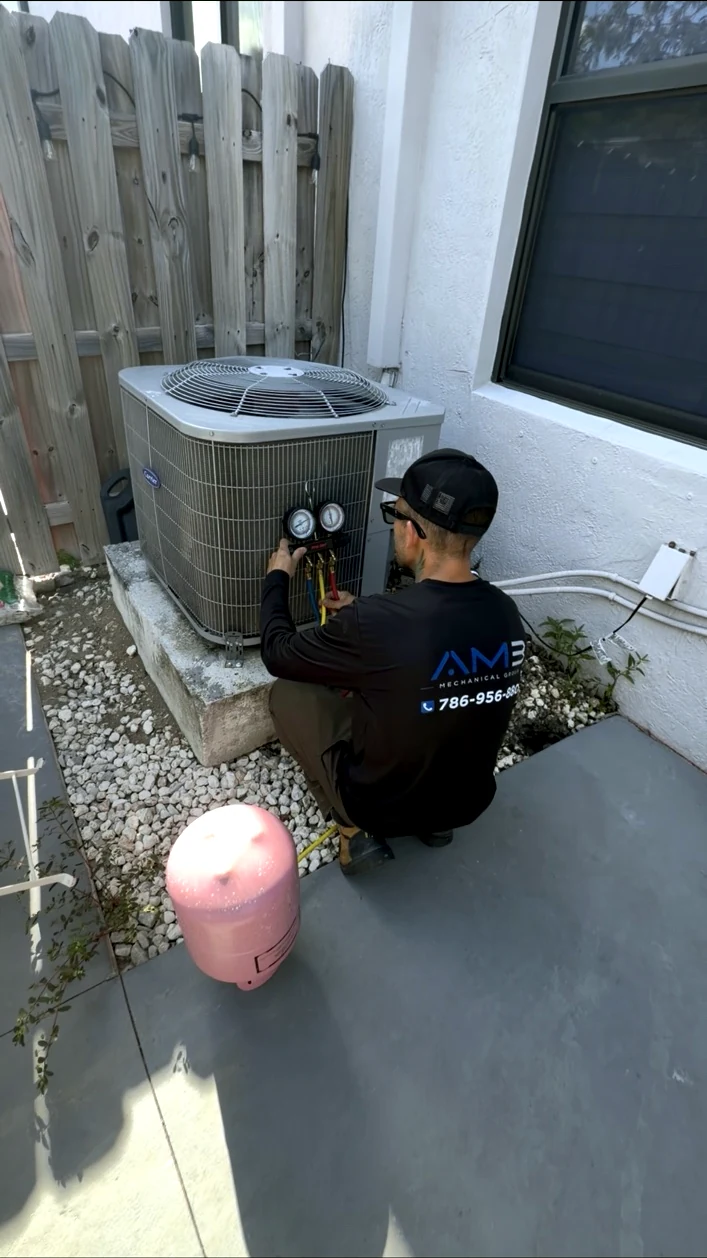 AMB Mechanical Group technician performing professional HVAC diagnostic service in Miami